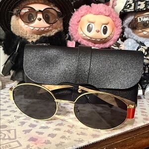 Elegant Gold and Black Sunglasses